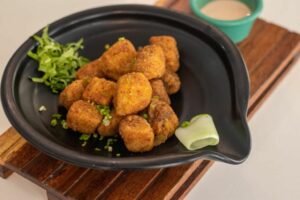 Dados de pescado al curry